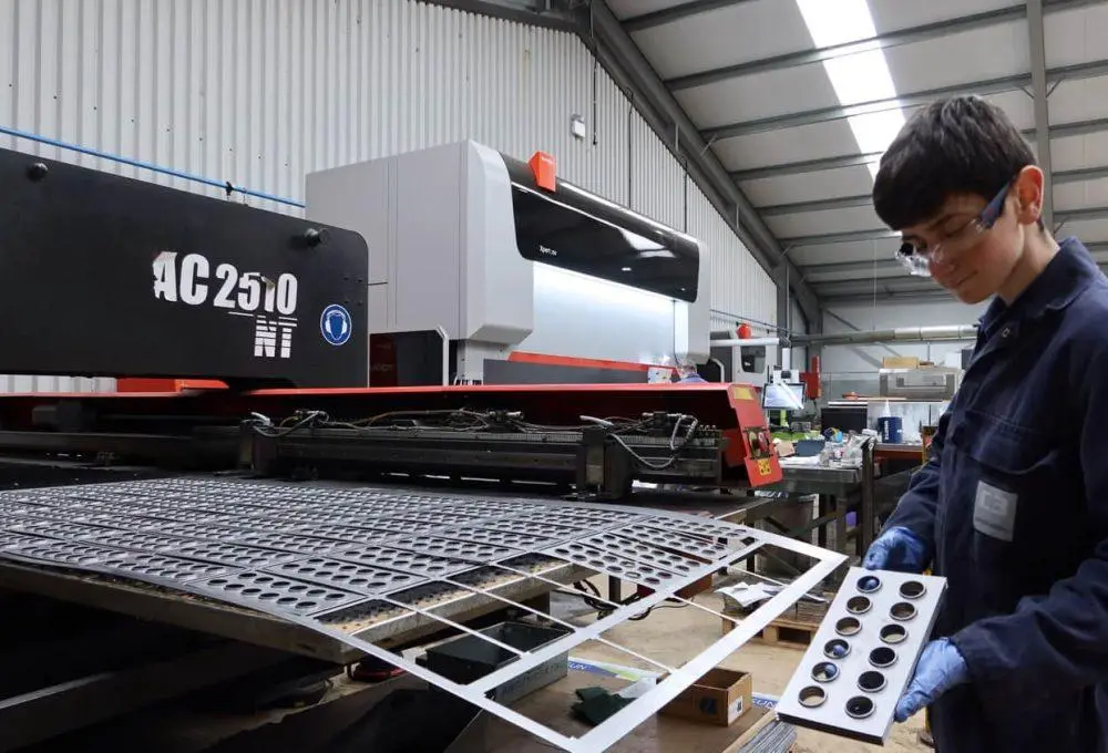 Quality inspection of laser-cut sheet metal components in a manufacturing workshop